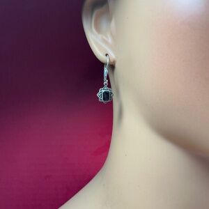 Sterling Silver dangle earrings with a black onyx stone. 1.25 inches long
